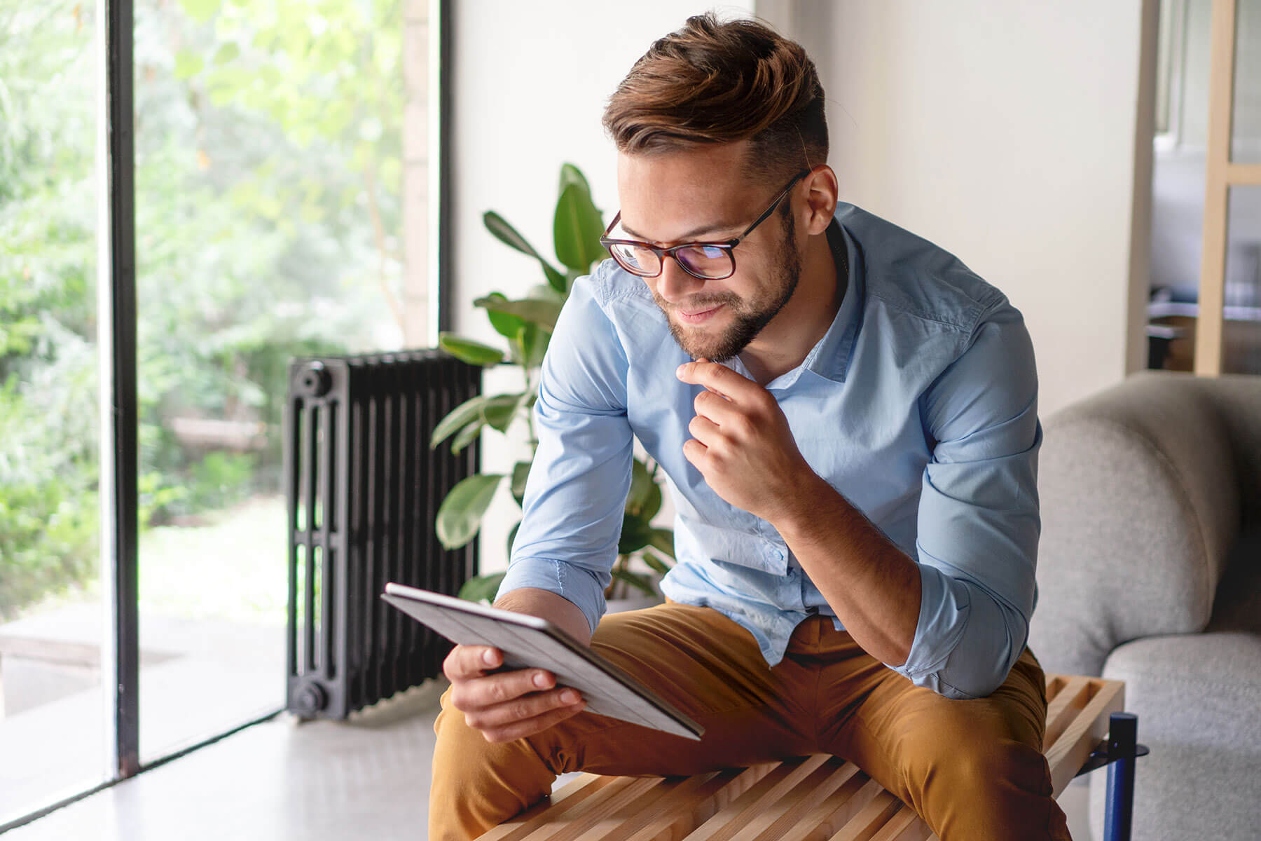 Man looking at tablet screen