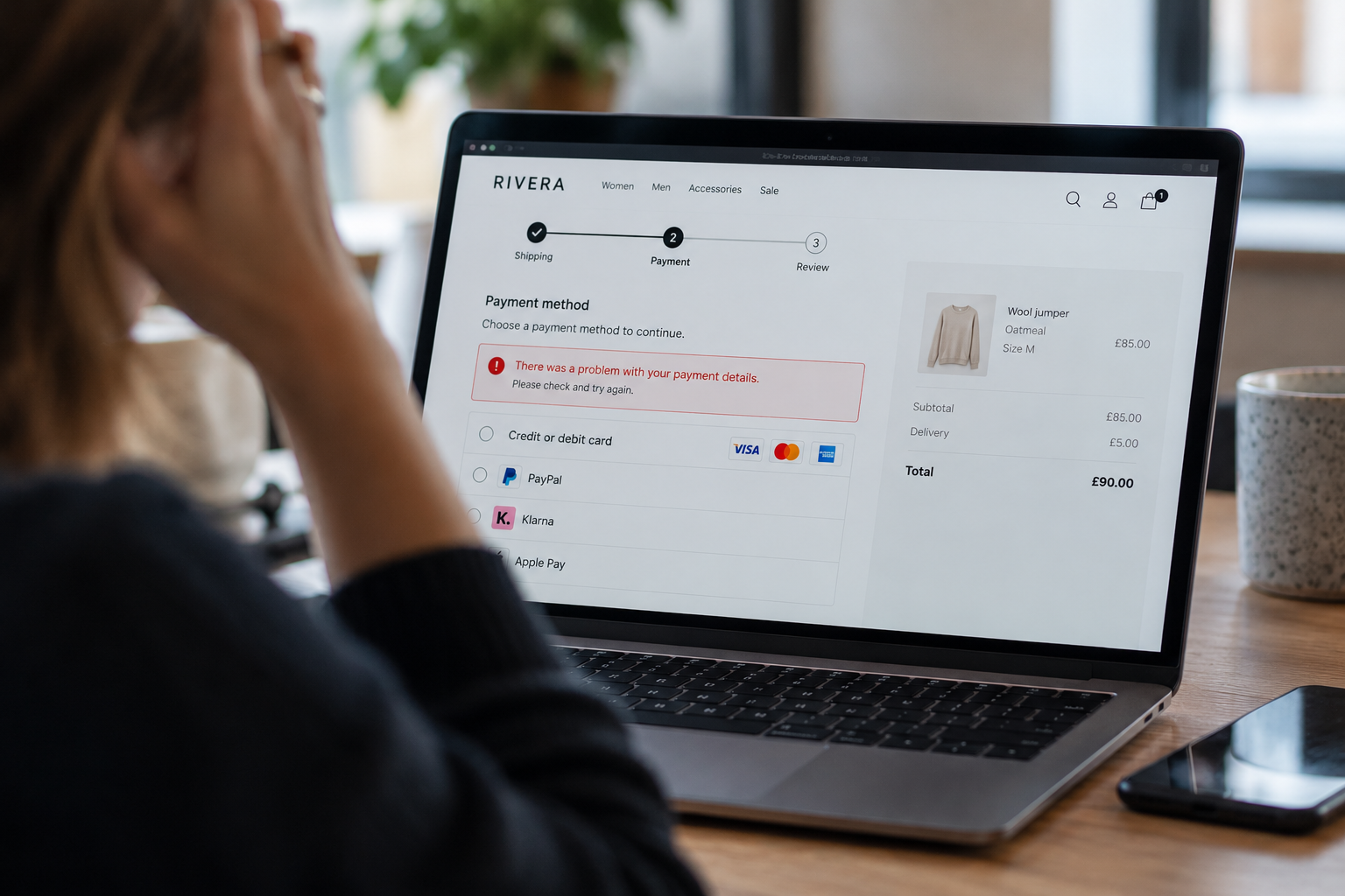 Checkout Payment Error on Laptop Shopper encountering a payment error during an ecommerce checkout on a laptop